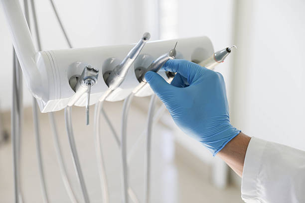 Professional Root Canal Treatment technician working in Man, WV